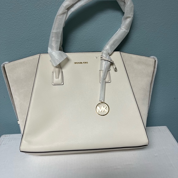 Michael Kors Cream Tote with Winged Sides and Silver Hardware